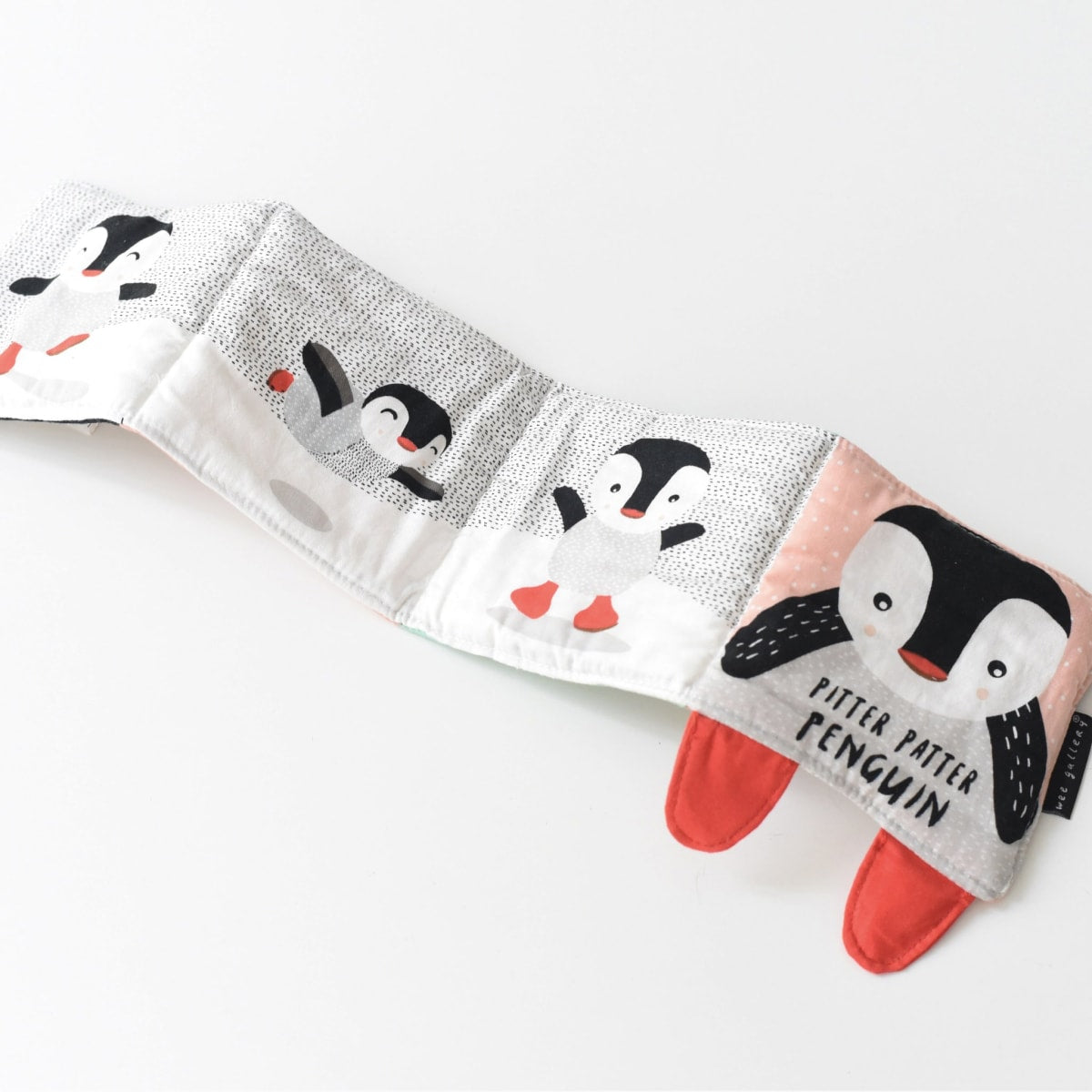 Pitter Patter Penguin, o livro de tecido para bebé 